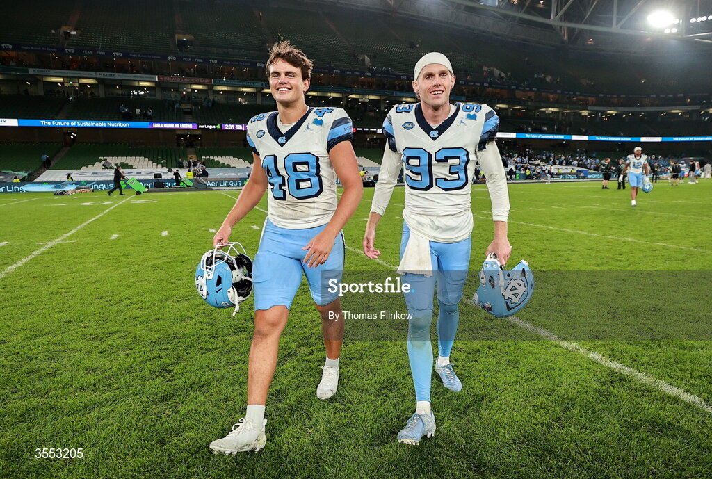 29 August 2026; North Carolina long snapper Gannon Burt #48 and North Carolina kicker Jacob Horvath #93 after their side's victory in the 2026 Aer Lingus College Football Classic match between TCU and North Carolina at the Aviva Stadium in Dublin. Photo by Thomas Flinkow/Sportsfile