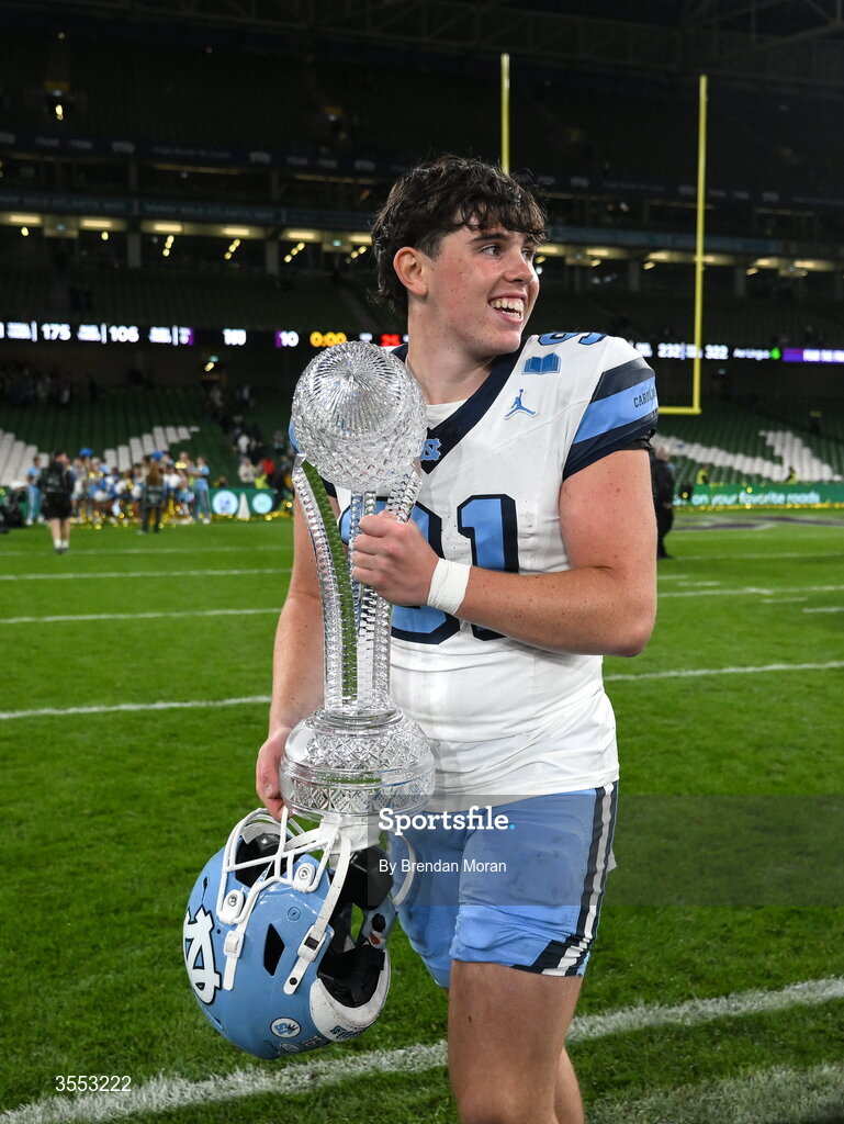 29 August 2026; North Carolina punter Adam McCann-Gibbs #91 with the trophy after his side's victory in the 2026 Aer Lingus College Football Classic match between TCU and North Carolina at the Aviva Stadium in Dublin. Photo by Brendan Moran/Sportsfile