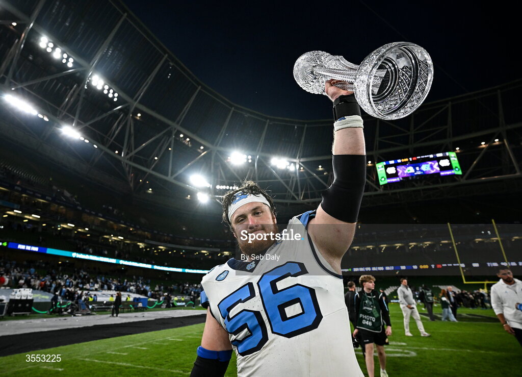29 August 2026; North Carolina offensive lineman Christo Kelly #56 celebratese with the trophy after his side's victory in the 2026 Aer Lingus College Football Classic match between TCU and North Carolina at the Aviva Stadium in Dublin. Photo by Seb Daly/Sportsfile