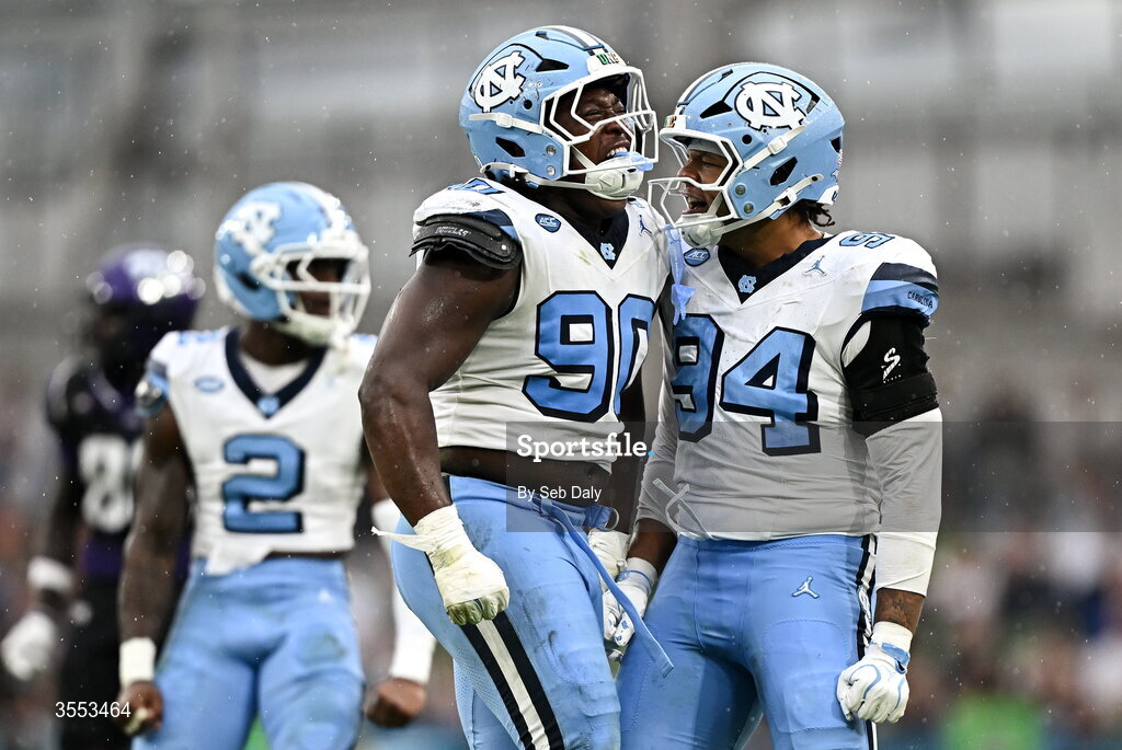 29 August 2026; North Carolina defensive linemen Xavier Lewis #90, left, and David Jackson III #94 celebrate during the 2026 Aer Lingus College Football Classic match between TCU and North Carolina at the Aviva Stadium in Dublin. Photo by Seb Daly/Sportsfile