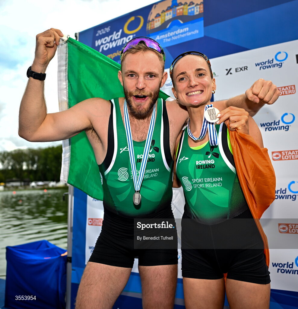30 August 2026; Konan Pazzaia and Margaret Cremen of Ireland celebrate with their silver medals after the mixed Double Sculls Final A during the 2026 World Rowing Championships at Bosbaan in Amsterdam, Netherlands. Photo by Benedict Tufnell/Sportsfile