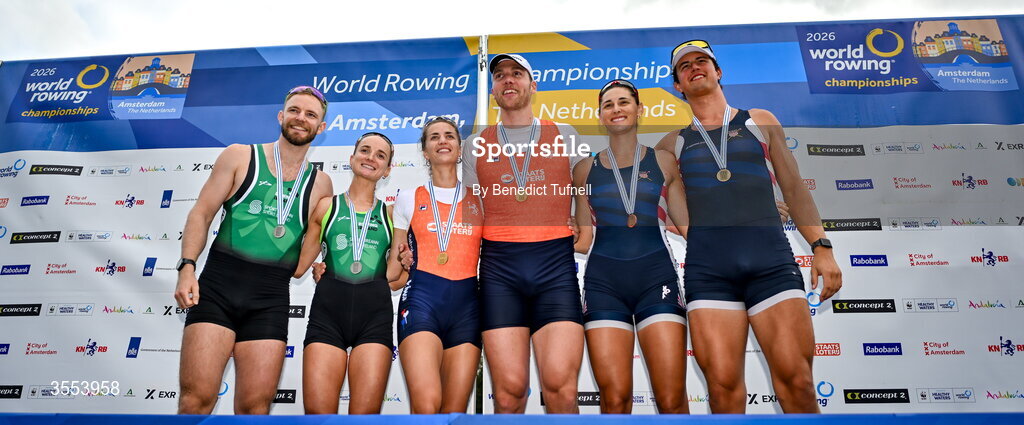 30 August 2026; Konan Pazzaia and Margaret Cremen of Ireland pose on the podium after placing second in the mixed Double Sculls Final during the 2026 World Rowing Championships at Bosbaan in Amsterdam, Netherlands. Photo by Benedict Tufnell/Sportsfile