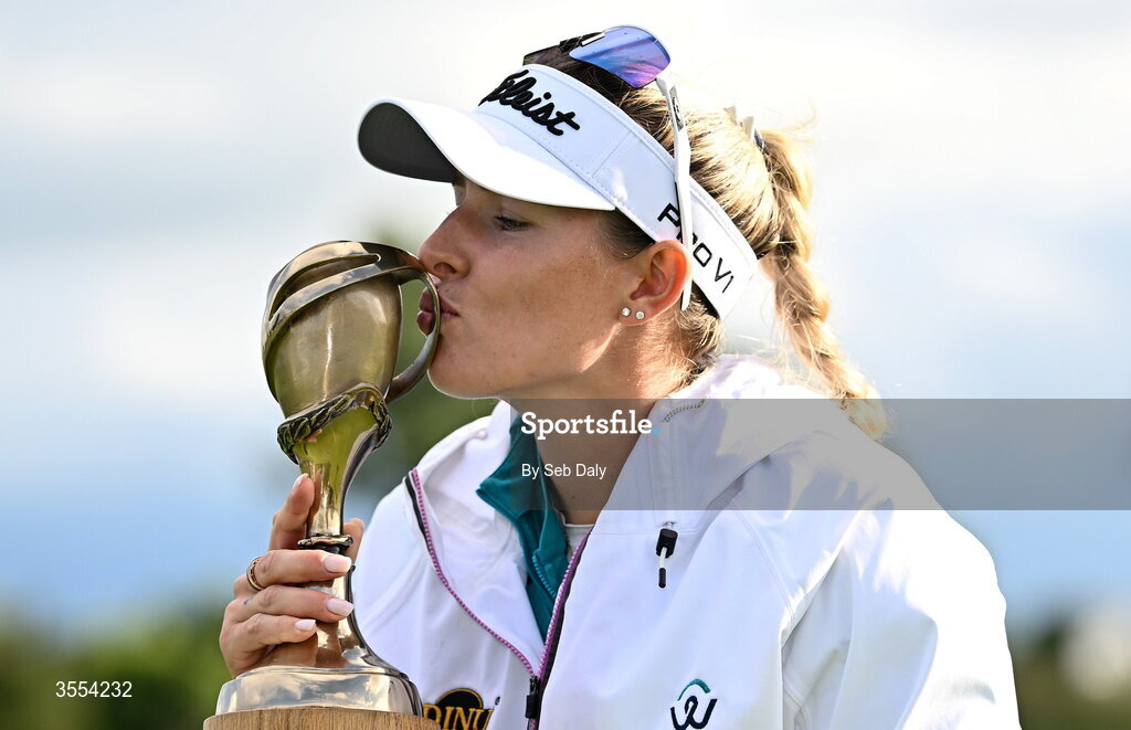 30 August 2026; Casandra Alexander of South Africa kisses the trophy after winning the 2026 KPMG Women’s Irish Open Golf Championship at The K Club in Straffan, Kildare. Photo by Seb Daly/Sportsfile