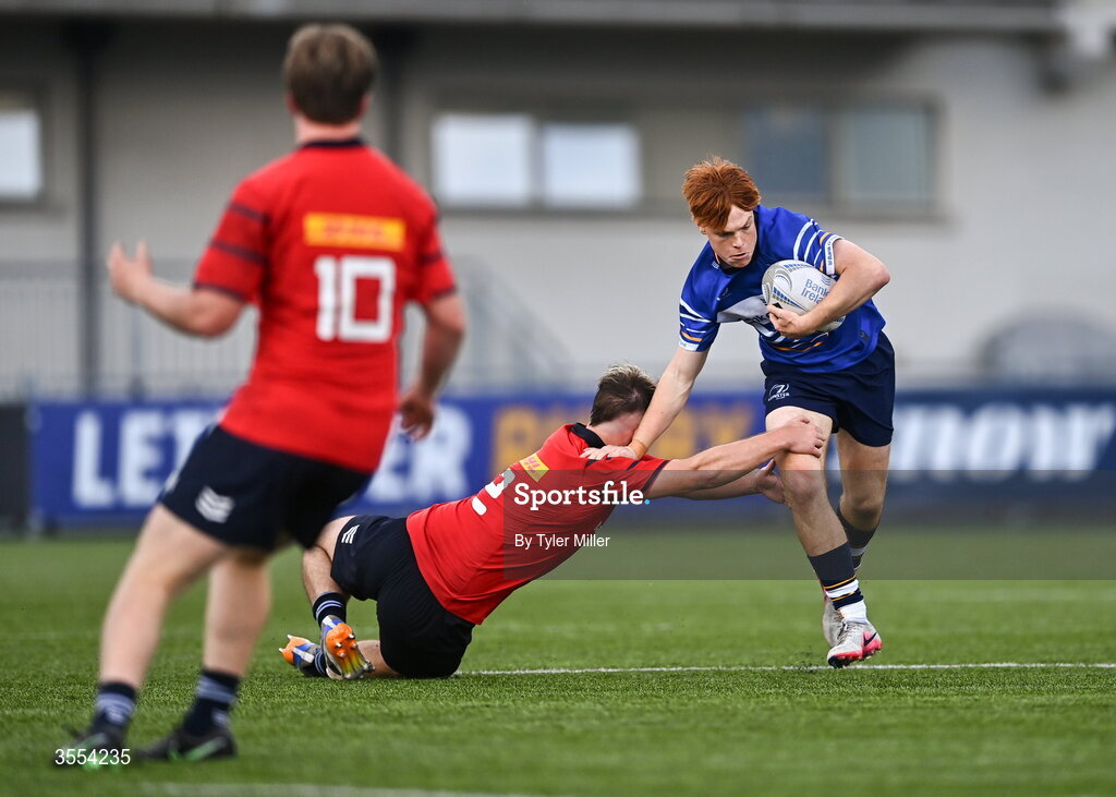 30 August 2026; Michael Kenny of Leinster evades the tackle of William Hanley of Munster during the PwC U19 InterProvincial Championship match between Leinster and Munster at Energia Park in Dublin. Photo by Tyler Miller/Sportsfile