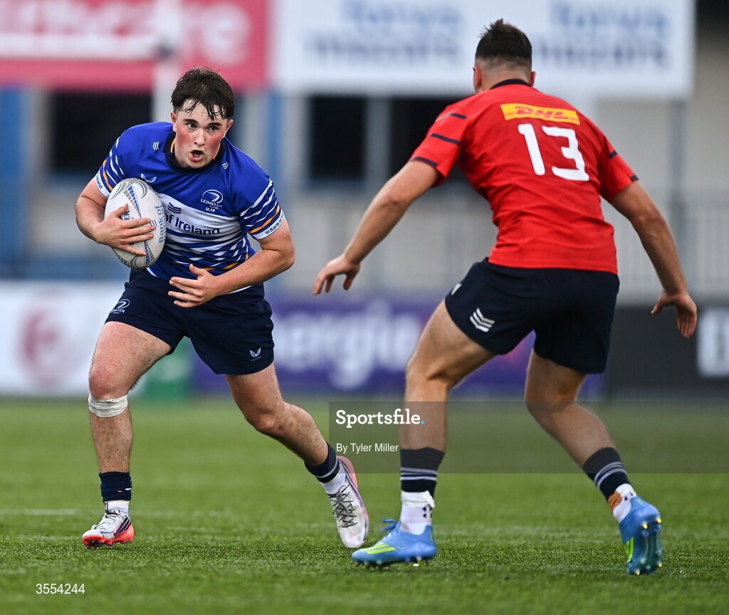 30 August 2026; Tom Martin of Leinster in action against Cathal O'Mara of Munster during the PwC U19 InterProvincial Championship match between Leinster and Munster at Energia Park in Dublin. Photo by Tyler Miller/Sportsfile
