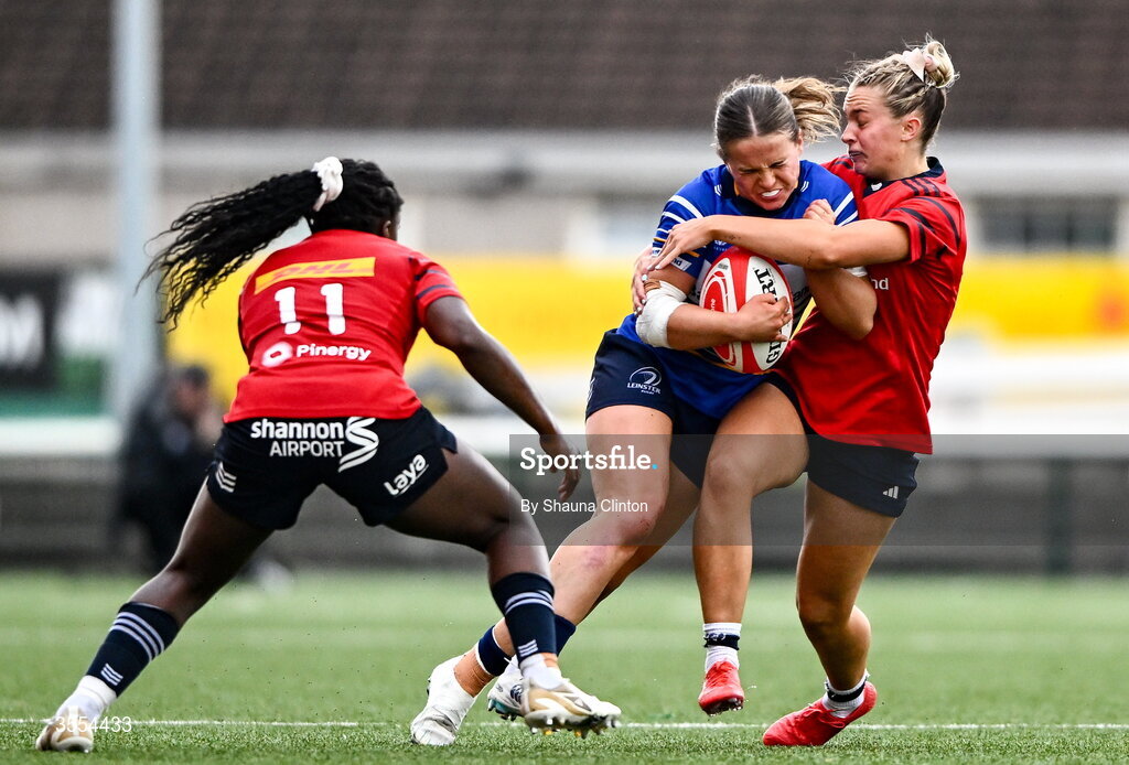 29 August 2026; Robyn O'Connor of Leinster in action against Munster players Chisom Ugwueru, left, and Lucia Linn/ during the Vodafone Womens Interprovincial Championship final match between Munster and Leinster at Dexcom Stadium in Galway. Photo by Shauna Clinton/Sportsfile