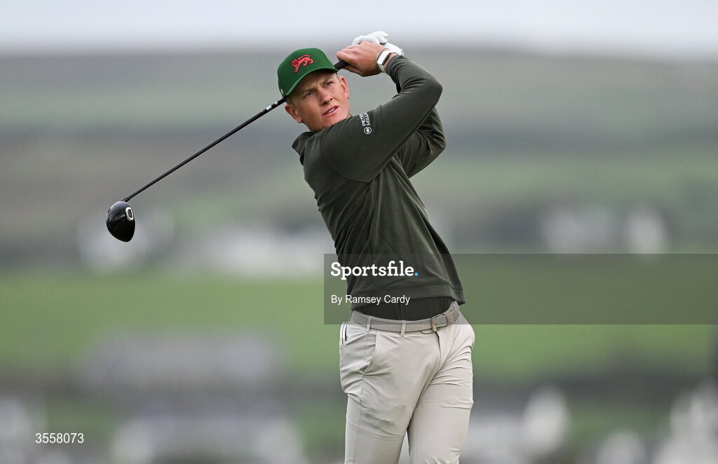 5 September 2026; Luke Poulter of Great Britain and Ireland watches his tee shot on the second hole during the foursomes matches on day one of the 51st Walker Cup at Lahinch Golf Club in Lahinch, Clare. Photo by Ramsey Cardy/Sportsfile