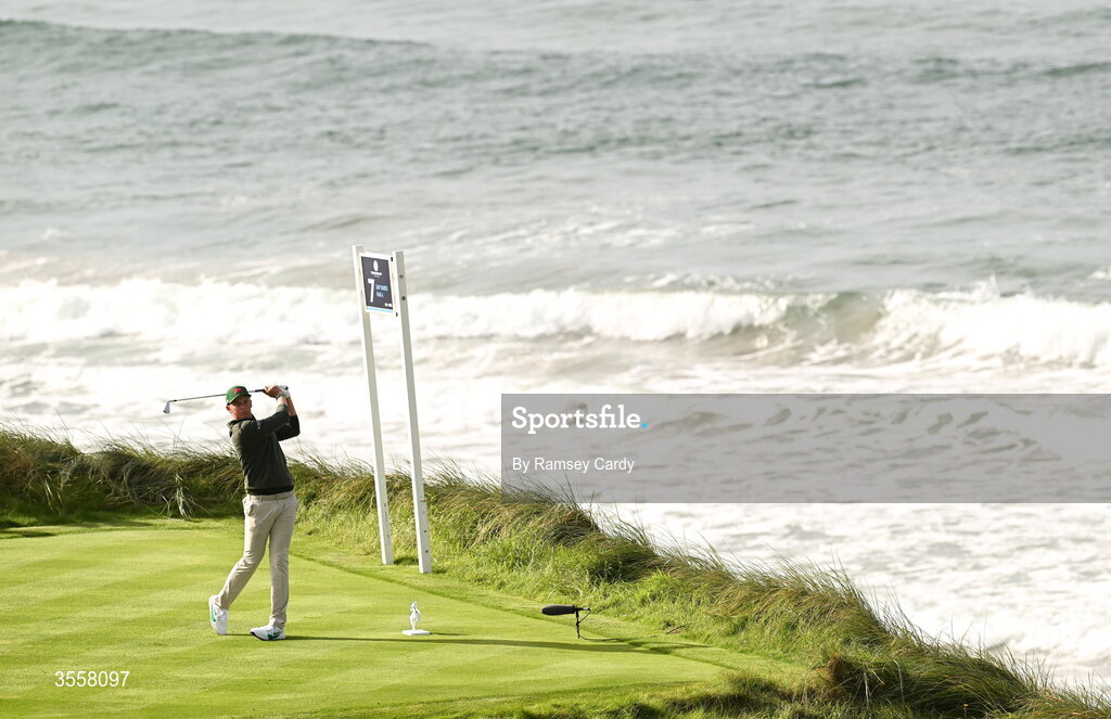 5 September 2026; Niall Sheils Donegan of Great Britain and Ireland watches his tee shot on the seventh hole during the foursomes matches on day one of the 51st Walker Cup at Lahinch Golf Club in Lahinch, Clare. Photo by Ramsey Cardy/Sportsfile