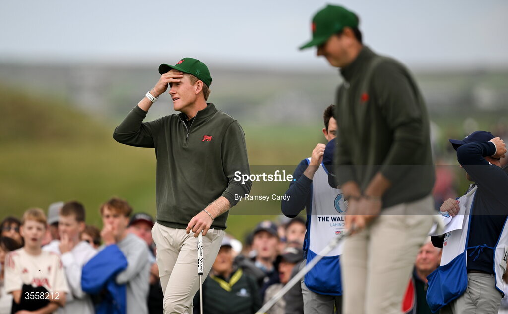 5 September 2026; Luke Poulter, left, reacts to a missed putt by Sam Easterbrook of Great Britain and Ireland on the 18th green during the foursomes matches on day one of the 51st Walker Cup at Lahinch Golf Club in Lahinch, Clare. Photo by Ramsey Cardy/Sportsfile