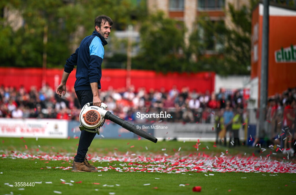 5 September 2026; St Patrick's Athletic ground staff use leaf-blowers to clear the confetti from the pitch, which casused a delay to kick-off, before the Club Orange Men’s FAI Cup quarter-final match between St Patrick's Athletic and Bohemians at Richmond Park in Dublin. Photo by Ben McShane/Sportsfile