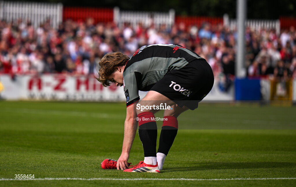 5 September 2026; Harry Vaughan of Bohemians retrieves his boot during the Club Orange Men’s FAI Cup quarter-final match between St Patrick's Athletic and Bohemians at Richmond Park in Dublin. Photo by Ben McShane/Sportsfile