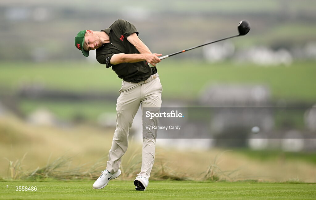 5 September 2026; Connor Graham of Great Britain and Ireland watches his tee shot on the second hole during the singles matches on day one of the 51st Walker Cup at Lahinch Golf Club in Lahinch, Clare. Photo by Ramsey Cardy/Sportsfile