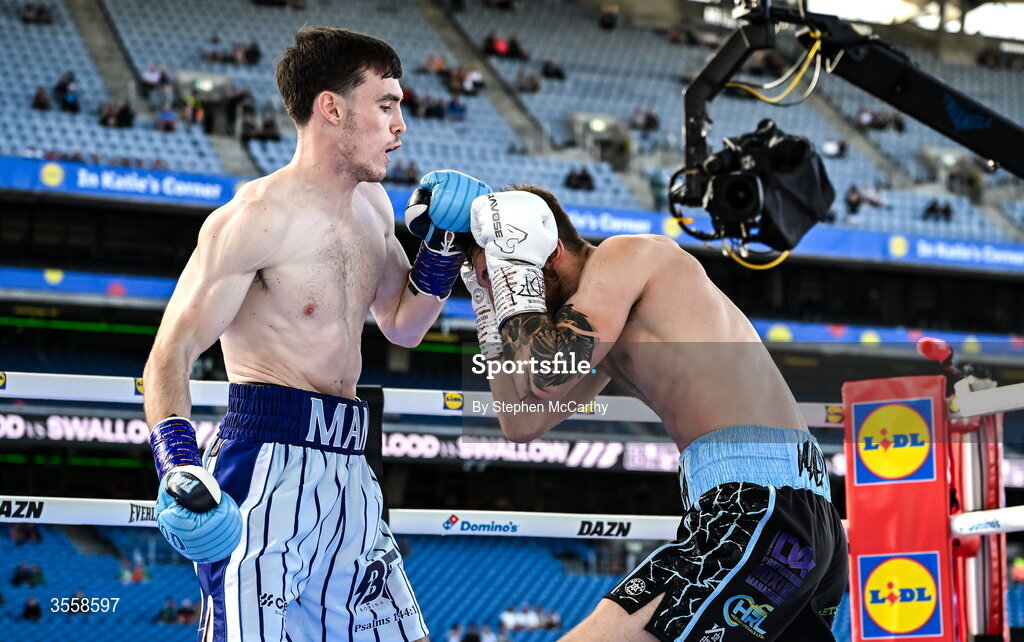 5 September 2026; Bobbi Flood, left, and Jack Swallow during their super welterweight bout at the Once Upon A Time fight night in Croke Park, Dublin. Photo by Stephen McCarthy/Sportsfile