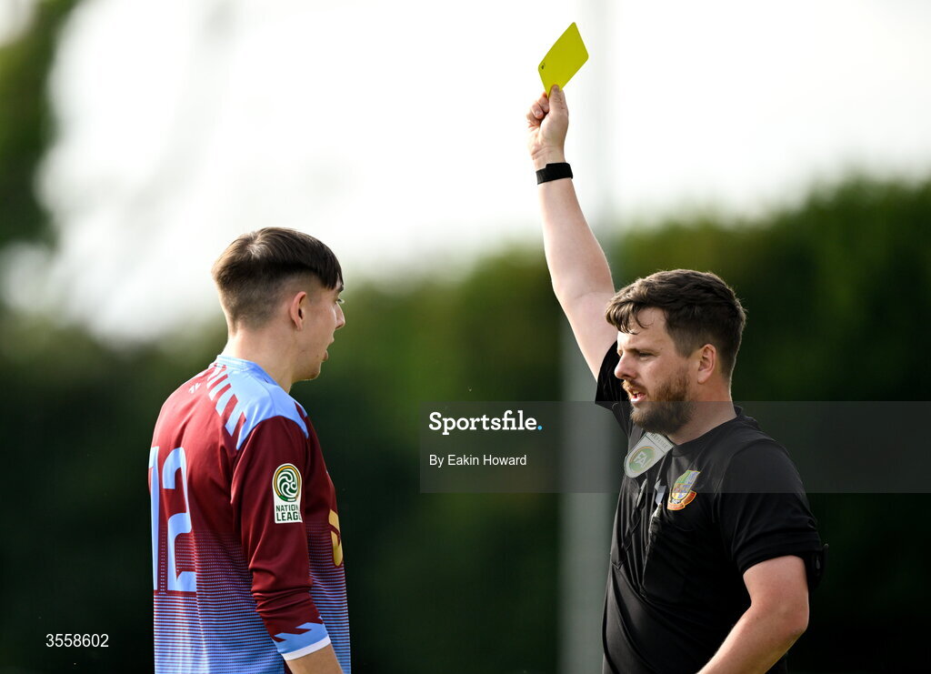 5 September 2026; Referee Eric Mccann gives a yellow card to Daniel Brennan of Mervue United during the FAI National League match between Lucan United and Mervue United at Copper Face Jacks Park in Dublin. Photo by Eakin Howard/Sportsfile
