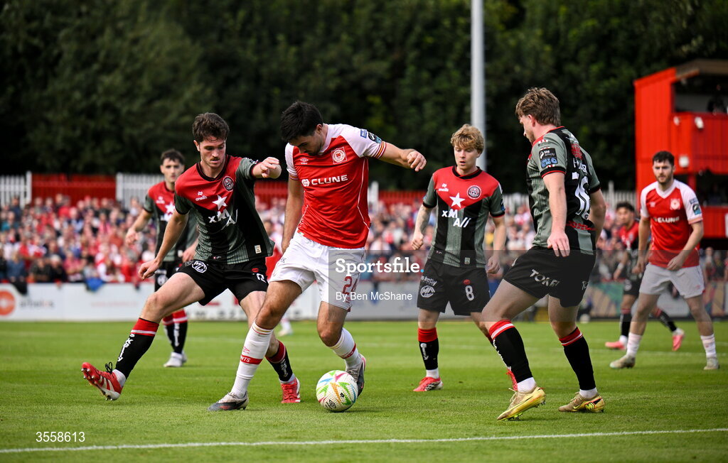 5 September 2026; Luke Turner of St Patrick's Athletic in action against Bohemians players, from left, Patrick Hickey, Harry Vaughan and Cian Byrne during the Club Orange Men’s FAI Cup quarter-final match between St Patrick's Athletic and Bohemians at Richmond Park in Dublin. Photo by Ben McShane/Sportsfile