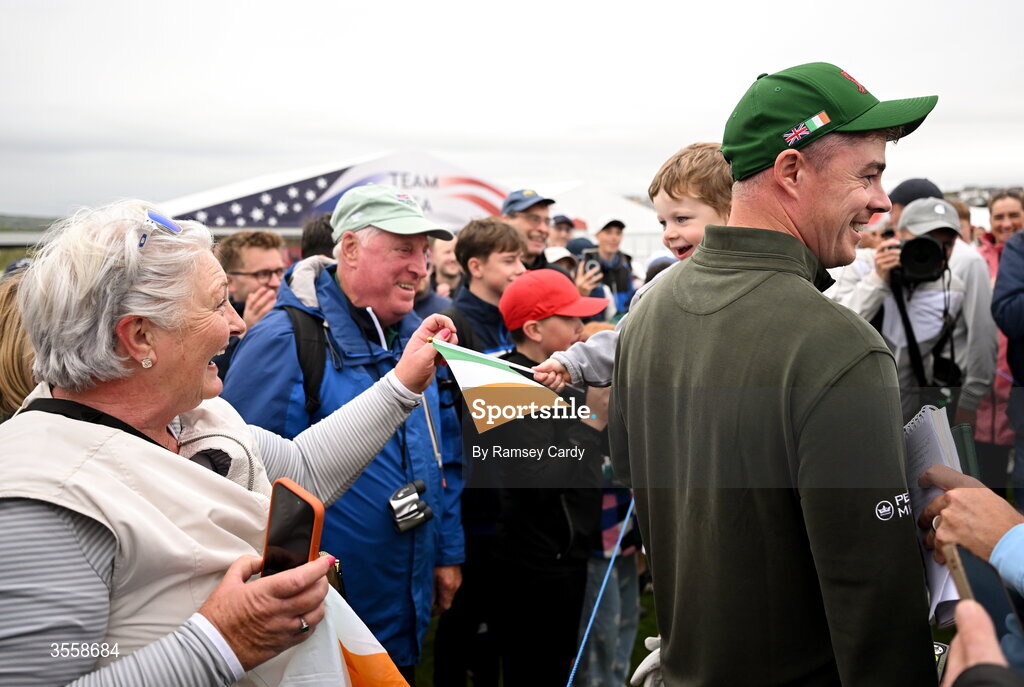 5 September 2026; Stuart Grehan of Great Britain and Ireland is interviewed with his son Kai after the singles matches on day one of the 51st Walker Cup at Lahinch Golf Club in Lahinch, Clare. Photo by Ramsey Cardy/Sportsfile