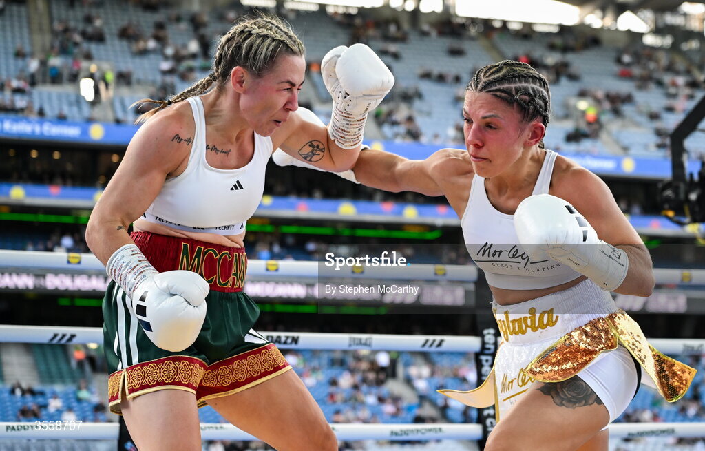 5 September 2026; Molly McCann, left, and Sylwia Doligala during their bantamweight bout at the Once Upon A Time fight night in Croke Park, Dublin. Photo by Stephen McCarthy/Sportsfile