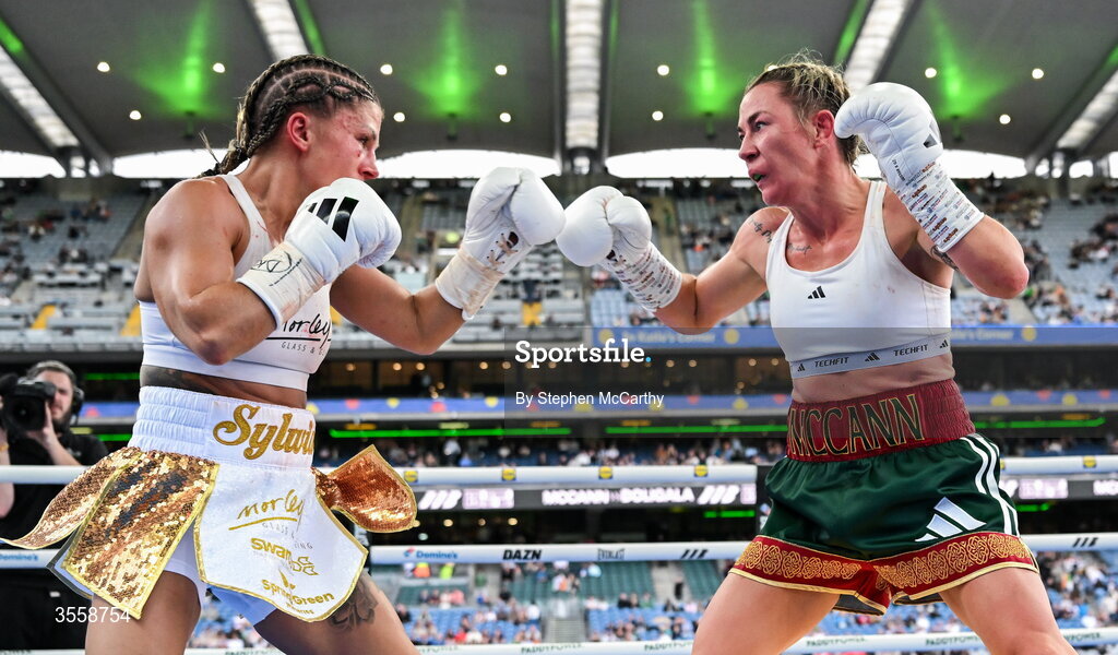 5 September 2026; Molly McCann, right, and Sylwia Doligala during their bantamweight bout at the Once Upon A Time fight night in Croke Park, Dublin. Photo by Stephen McCarthy/Sportsfile