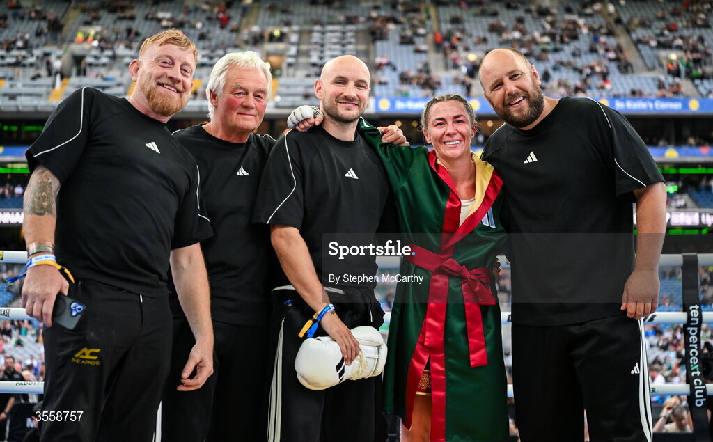 5 September 2026; Molly McCann, second from right, celebrates with her team after being declared victorious in her bantamweight bout with Sylwia Doligala at the Once Upon A Time fight night in Croke Park, Dublin. Photo by Stephen McCarthy/Sportsfile