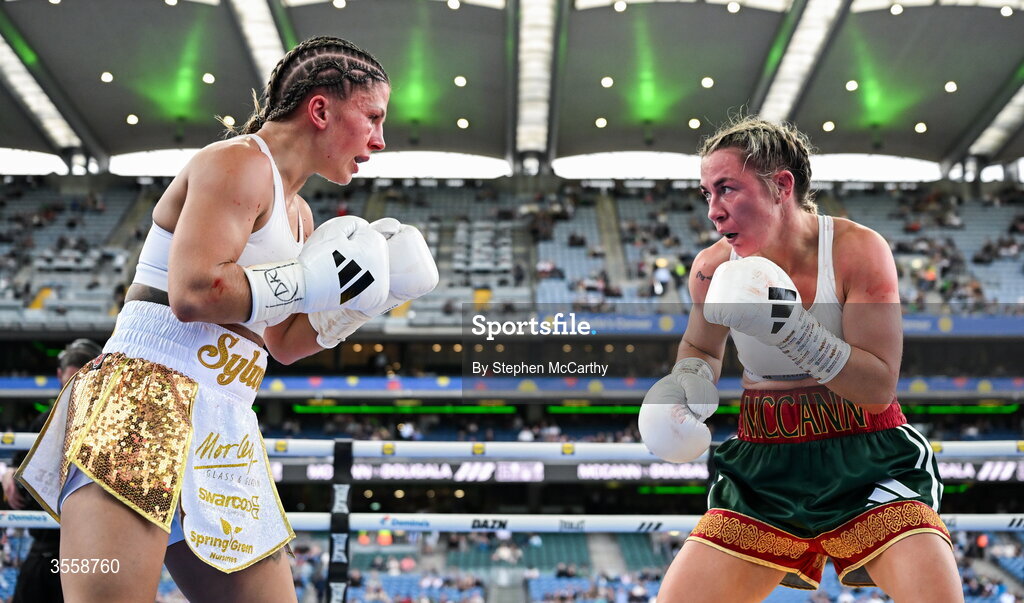 5 September 2026; Molly McCann, right, and Sylwia Doligala during their bantamweight bout at the Once Upon A Time fight night in Croke Park, Dublin. Photo by Stephen McCarthy/Sportsfile