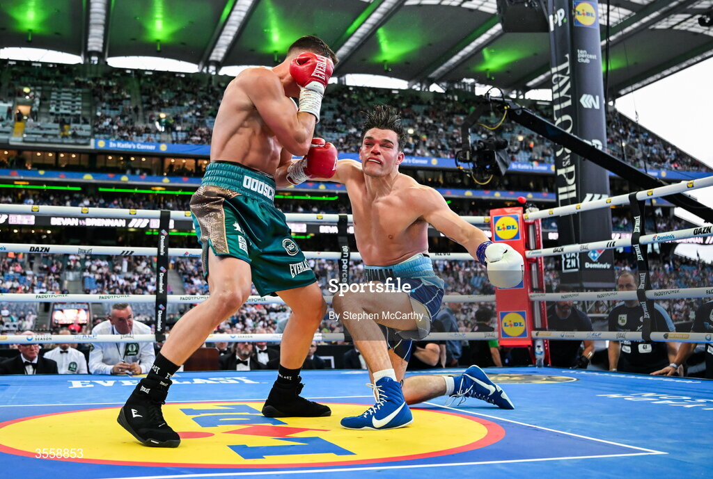 5 September 2026; Taylor Bevan, left, knocks down Emmet Brennan during their super middleweight bout at the Once Upon A Time fight night in Croke Park, Dublin. Photo by Stephen McCarthy/Sportsfile