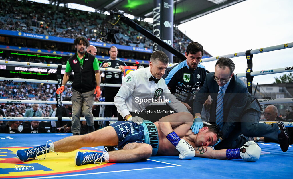 5 September 2026; Emmet Brennan is tended to after being knocked out in his super middleweight bout with Taylor Bevan at the Once Upon A Time fight night in Croke Park, Dublin. Photo by Stephen McCarthy/Sportsfile