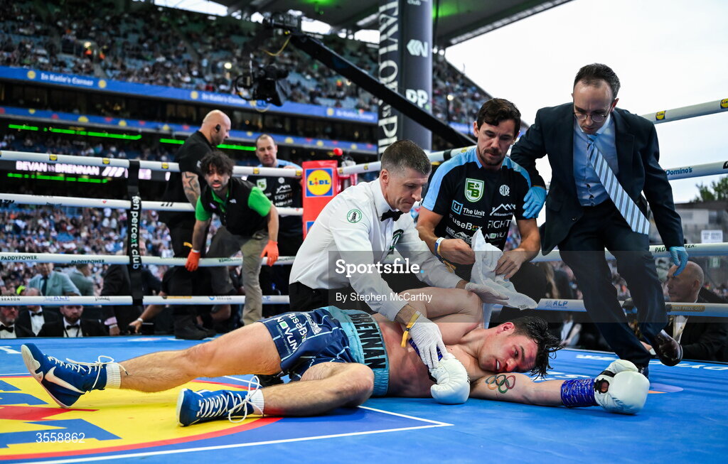 5 September 2026; Emmet Brennan is tended to after being knocked out in his super middleweight bout with Taylor Bevan at the Once Upon A Time fight night in Croke Park, Dublin. Photo by Stephen McCarthy/Sportsfile
