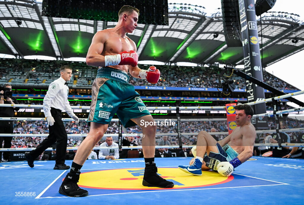 5 September 2026; Taylor Bevan, left, knocks down Emmet Brennan during their super middleweight bout at the Once Upon A Time fight night in Croke Park, Dublin.