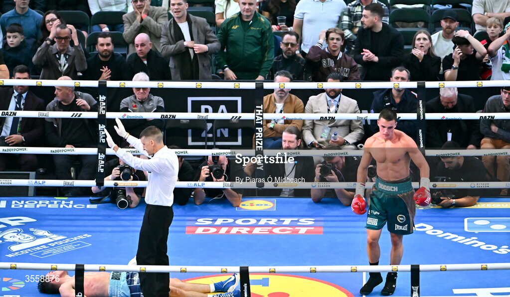 5 September 2026; Taylor Bevan, right, reacts after knocking down Emmet Brennan during their super middleweight bout at the Once Upon A Time fight night in Croke Park, Dublin. Photo by Piaras Ó Mídheach/Sportsfile