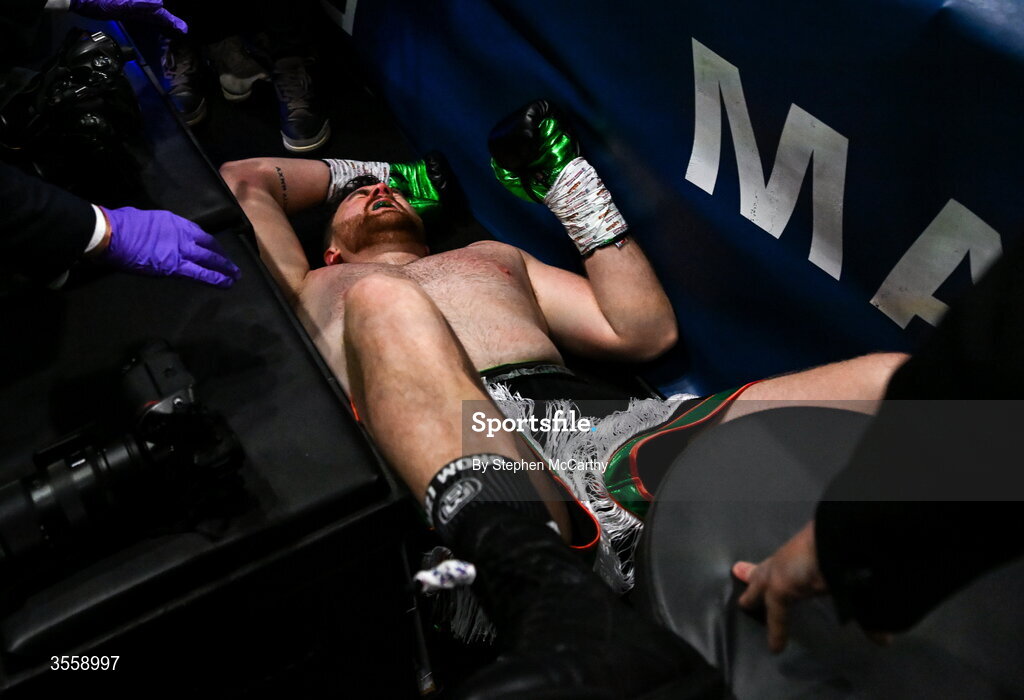 5 September 2026; Thomas Carty falls to the floor after being knocked through the ring ropes during his heavyweight bout by Dave Allen at the Once Upon A Time fight night in Croke Park, Dublin. Photo by Stephen McCarthy/Sportsfile