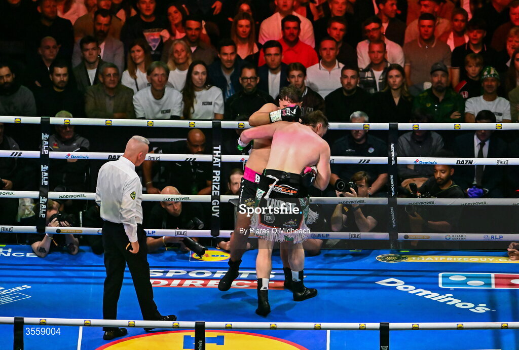 5 September 2026; Dave Allen, left, lands a punch on Thomas Carty which resulted in Thomas Carty falling through the ring ropes during their heavyweight bout at the Once Upon A Time fight night in Croke Park, Dublin. Photo by Piaras Ó Mídheach/Sportsfile