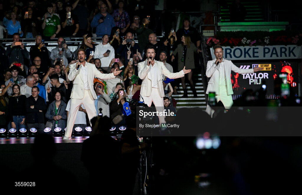5 September 2026; Kian Egan, left, Shane Filan, centre, and Nicky Byrne of Westlife perform ahead of the undisputed super lightweight championship fight between Katie Taylor and Flora Pili at the Once Upon A Time fight night in Croke Park, Dublin. Photo by Stephen McCarthy/Sportsfile