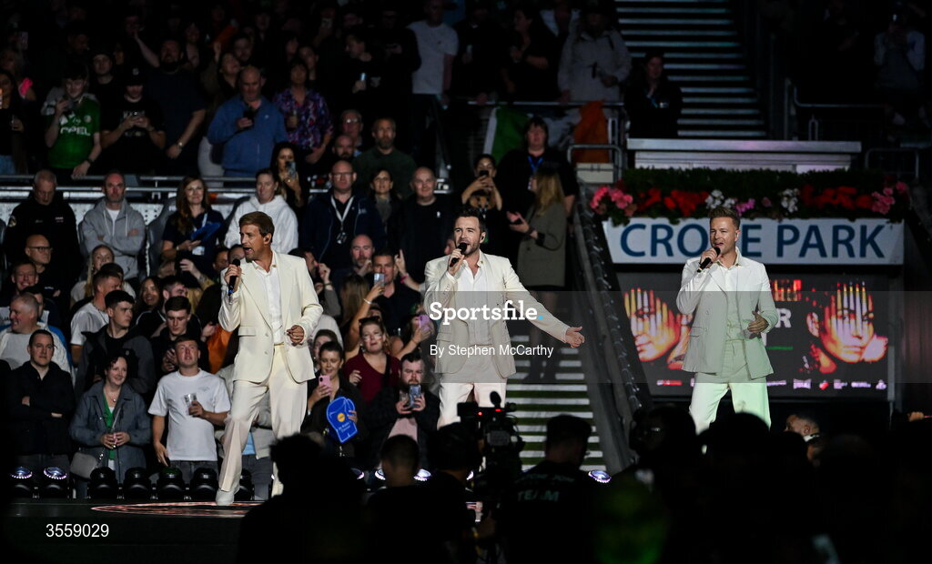 5 September 2026; Kian Egan, left, Shane Filan, centre, and Nicky Byrne of Westlife perform ahead of the undisputed super lightweight championship fight between Katie Taylor and Flora Pili at the Once Upon A Time fight night in Croke Park, Dublin. Photo by Stephen McCarthy/Sportsfile