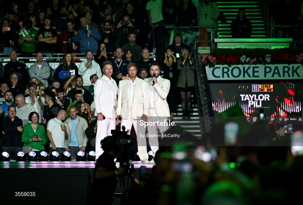 5 September 2026; Nicky Byrne, left, Kian Egan, centre, and Shane Filan of Westlife perform ahead of the undisputed super lightweight championship fight between Katie Taylor and Flora Pili at the Once Upon A Time fight night in Croke Park, Dublin. Photo by Stephen McCarthy/Sportsfile