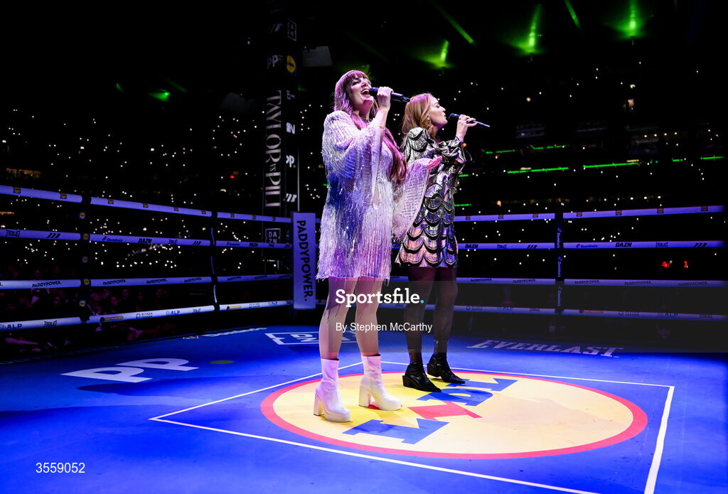 5 September 2026; Aoife Scott, left, and Róisín O perform Amhrán na bhFiann ahead of the undisputed super lightweight championship fight between Katie Taylor and Flora Pili at the Once Upon A Time fight night in Croke Park, Dublin. Photo by Stephen McCarthy/Sportsfile