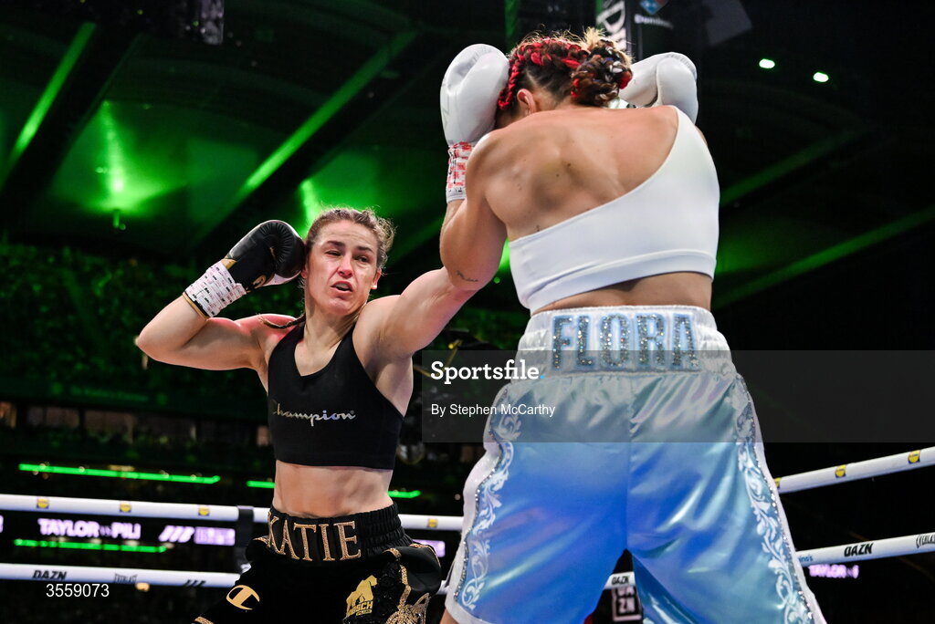 5 September 2026; Katie Taylor, left, and Flora Pili during their undisputed super lightweight championship fight at the Once Upon A Time fight night in Croke Park, Dublin. Photo by Stephen McCarthy/Sportsfile