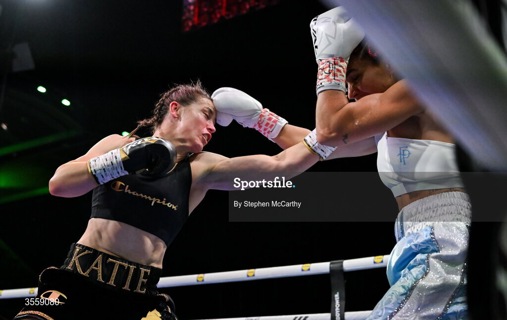 5 September 2026; Katie Taylor, left, and Flora Pili during their undisputed super lightweight championship fight at the Once Upon A Time fight night in Croke Park, Dublin. Photo by Stephen McCarthy/Sportsfile