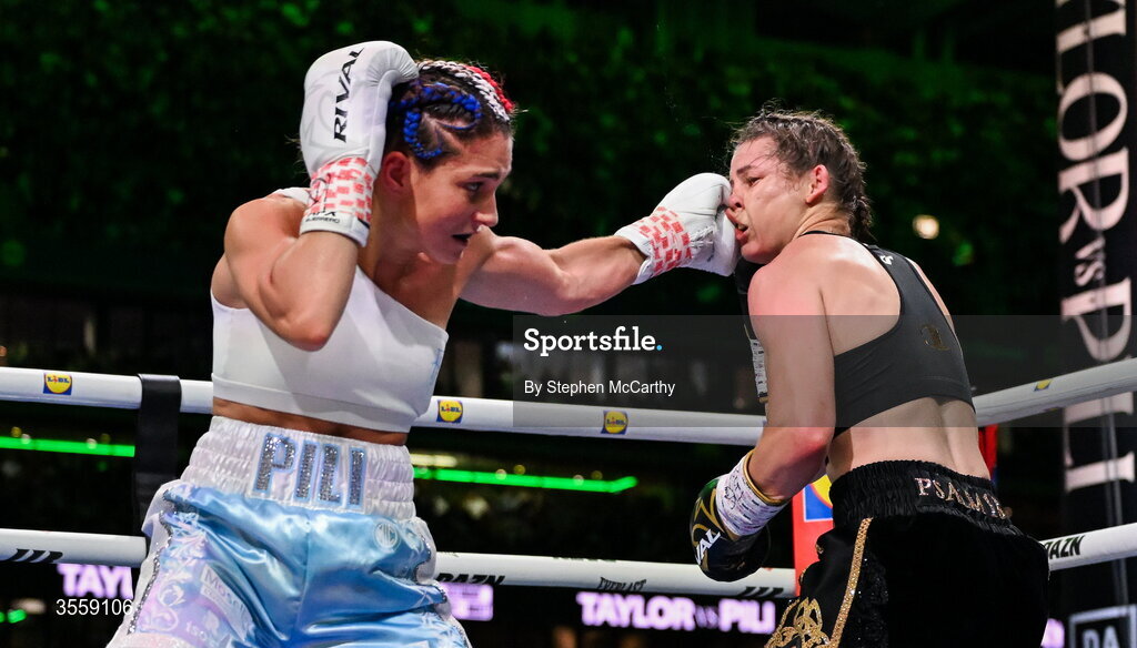 5 September 2026; Katie Taylor, right, and Flora Pili during their undisputed super lightweight championship fight at the Once Upon A Time fight night in Croke Park, Dublin. Photo by Stephen McCarthy/Sportsfile