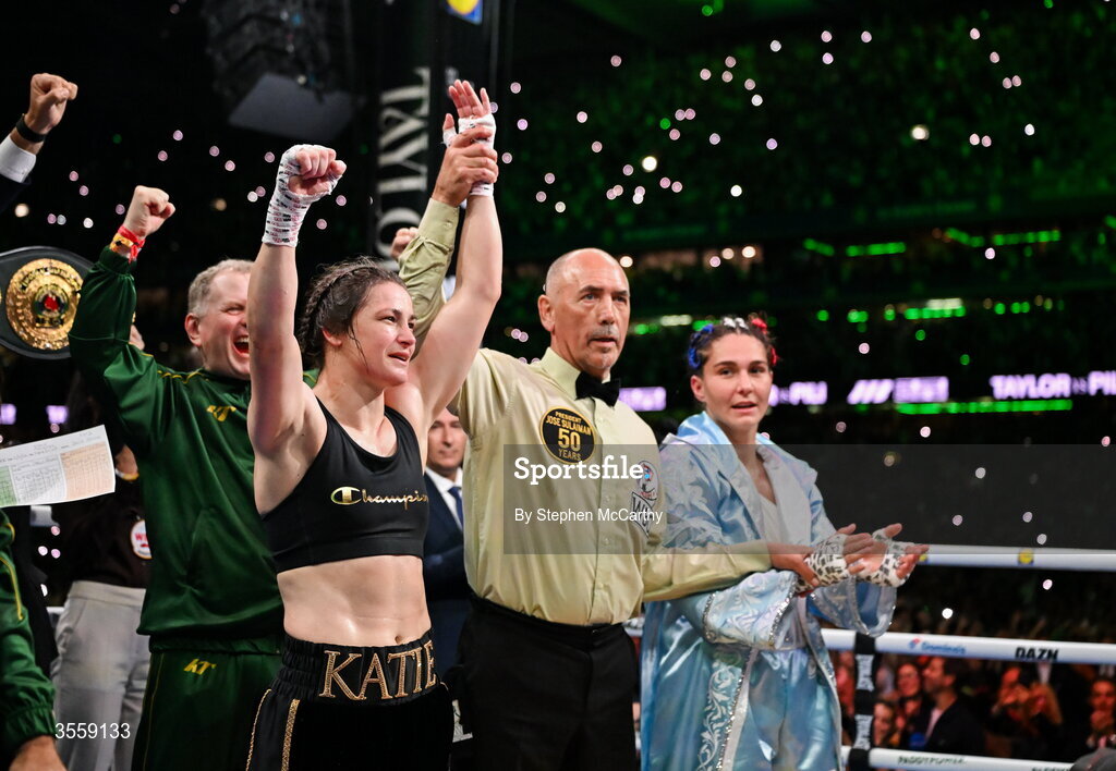 5 September 2026; Katie Taylor, left, is declared victorious in her undisputed super lightweight championship fight with Flora Pili by referee David Irving at the Once Upon A Time fight night in Croke Park, Dublin. Photo by Stephen McCarthy/Sportsfile