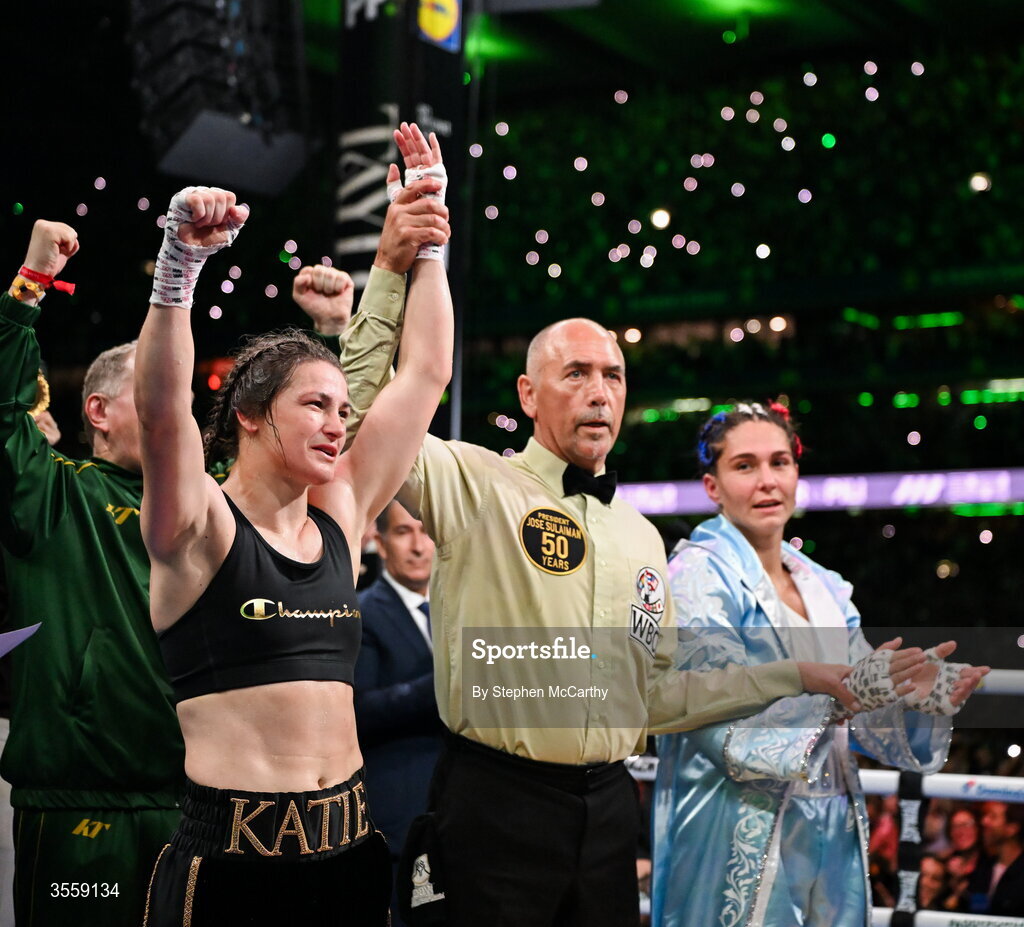 5 September 2026; Katie Taylor, left, is declared victorious in her undisputed super lightweight championship fight with Flora Pili by referee David Irving at the Once Upon A Time fight night in Croke Park, Dublin. Photo by Stephen McCarthy/Sportsfile