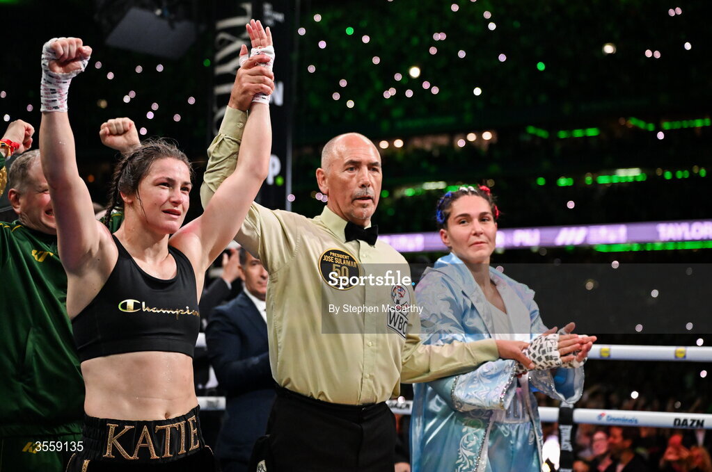 5 September 2026; Katie Taylor, left, is declared victorious in her undisputed super lightweight championship fight with Flora Pili by referee David Irving at the Once Upon A Time fight night in Croke Park, Dublin. Photo by Stephen McCarthy/Sportsfile
