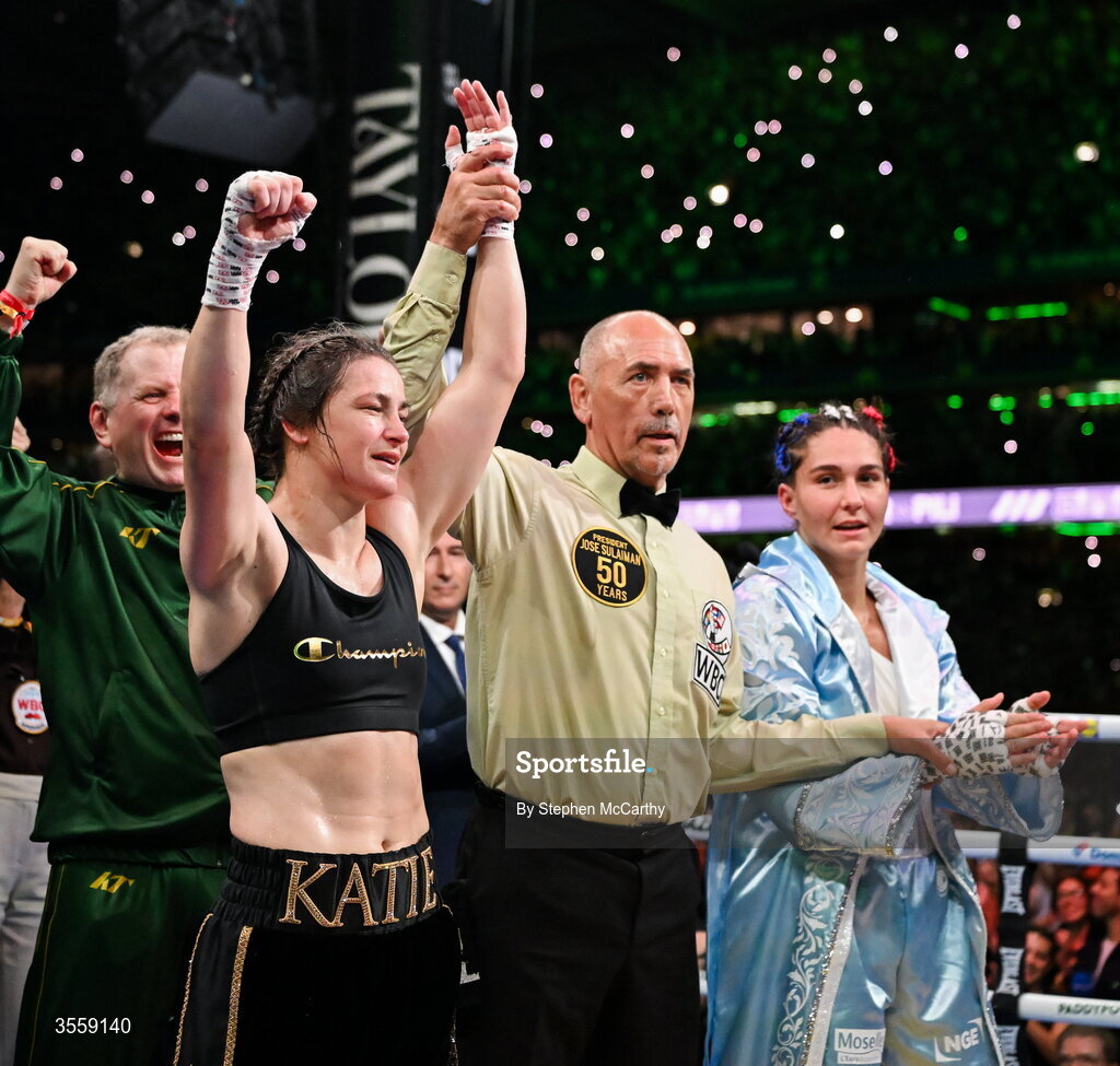 5 September 2026; Katie Taylor, left, is declared victorious in her undisputed super lightweight championship fight with Flora Pili by referee David Irving at the Once Upon A Time fight night in Croke Park, Dublin. Photo by Stephen McCarthy/Sportsfile