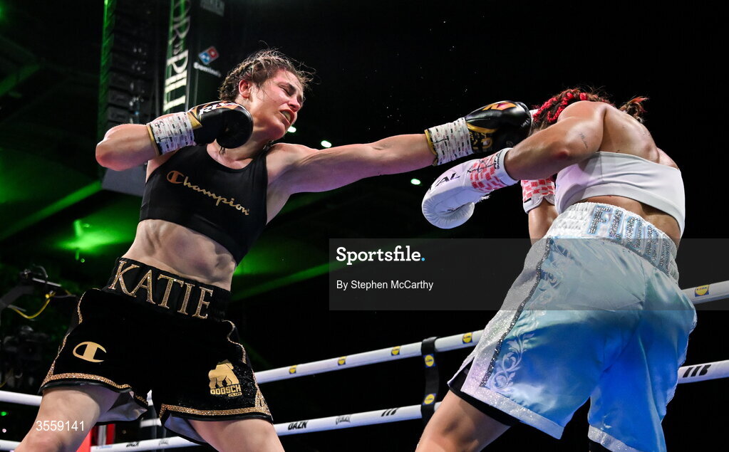 5 September 2026; Katie Taylor, left, and Flora Pili during their undisputed super lightweight championship fight at the Once Upon A Time fight night in Croke Park, Dublin. Photo by Stephen McCarthy/Sportsfile