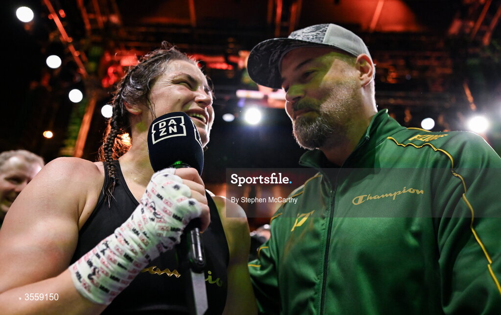 5 September 2026; Katie Taylor with her husband Sean McCavanagh after her undisputed super lightweight championship fight with Flora Pili at the Once Upon A Time fight night in Croke Park, Dublin. Photo by Stephen McCarthy/Sportsfile