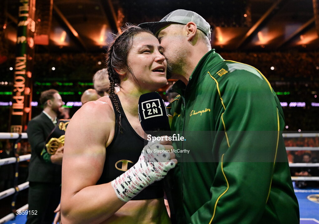 5 September 2026; Katie Taylor with her husband Sean McCavanagh after her undisputed super lightweight championship fight with Flora Pili at the Once Upon A Time fight night in Croke Park, Dublin. Photo by Stephen McCarthy/Sportsfile