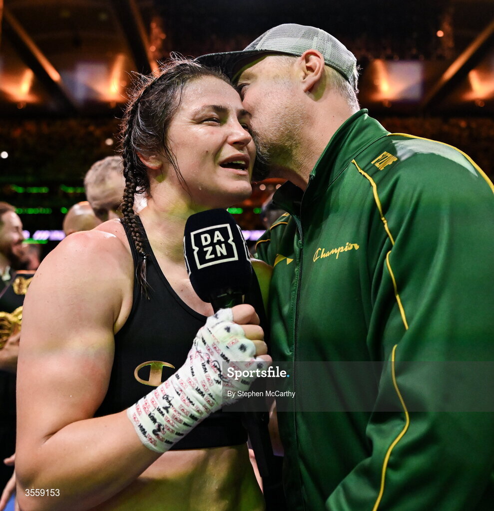 5 September 2026; Katie Taylor with her husband Sean McCavanagh after her undisputed super lightweight championship fight with Flora Pili at the Once Upon A Time fight night in Croke Park, Dublin. Photo by Stephen McCarthy/Sportsfile