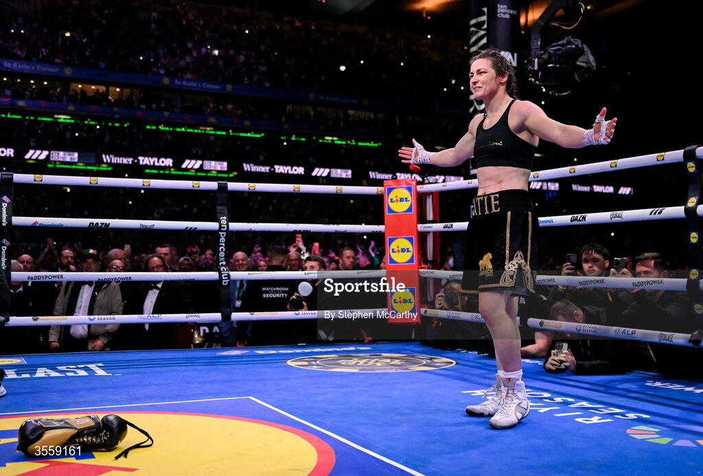 5 September 2026; Katie Taylor places her gloves onto the centre of the ring after her undisputed super lightweight championship fight with Flora Pili at the Once Upon A Time fight night in Croke Park, Dublin. Photo by Stephen McCarthy/Sportsfile