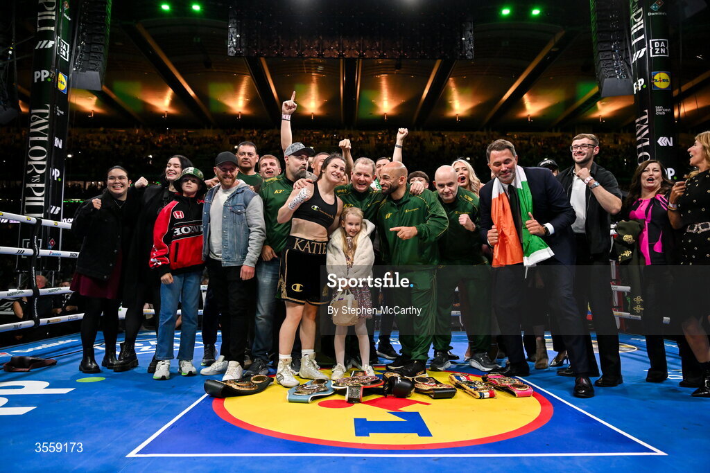 5 September 2026; Katie Taylor, centre left, celebrates with her team and family after her undisputed super lightweight championship fight with Flora Pili at the Once Upon A Time fight night in Croke Park, Dublin. Photo by Stephen McCarthy/Sportsfile