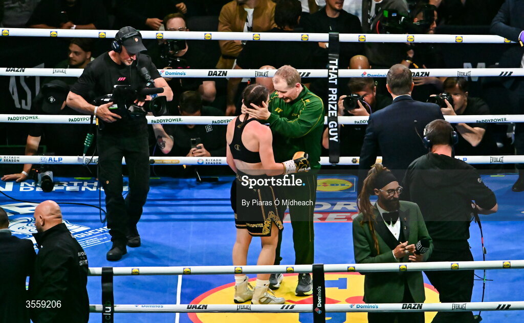 5 September 2026; Katie Taylor celebrates with her manager Brian Peters after her undisputed super lightweight championship fight with Flora Pili at the Once Upon A Time fight night in Croke Park, Dublin. Photo by Piaras Ó Mídheach/Sportsfile