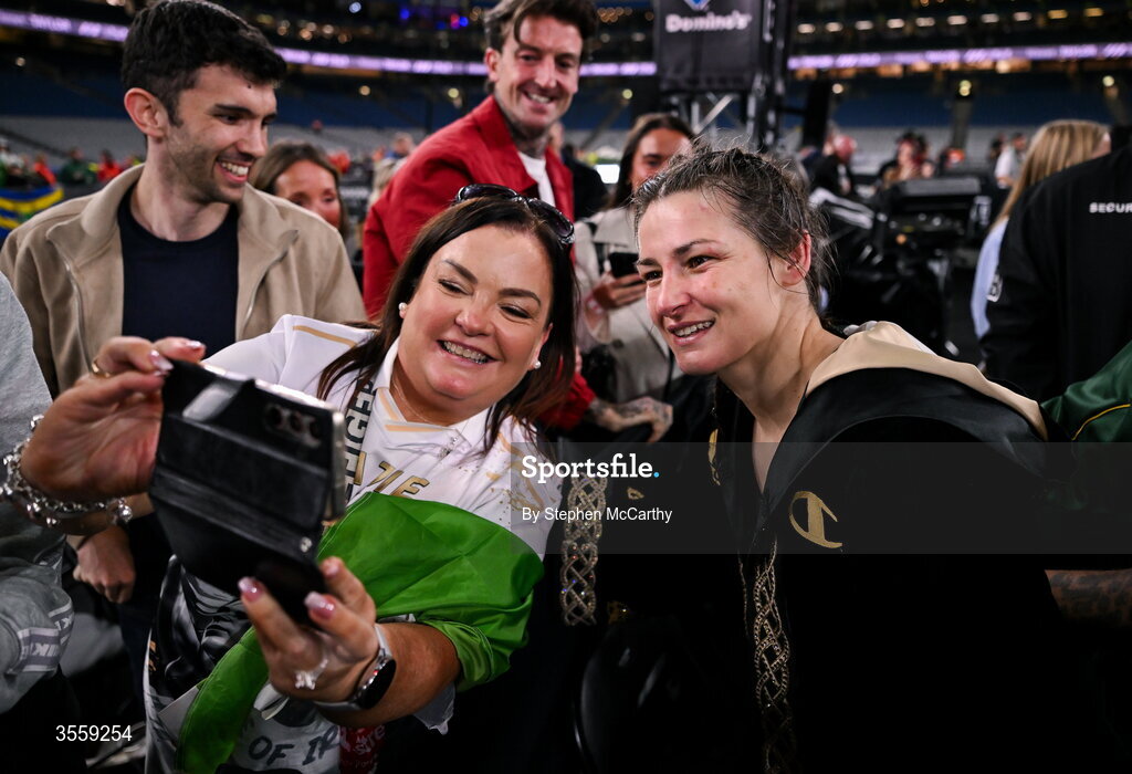 5 September 2026; Katie Taylor with supporters after her undisputed super lightweight championship fight with Flora Pili at the Once Upon A Time fight night in Croke Park, Dublin. Photo by Stephen McCarthy/Sportsfile